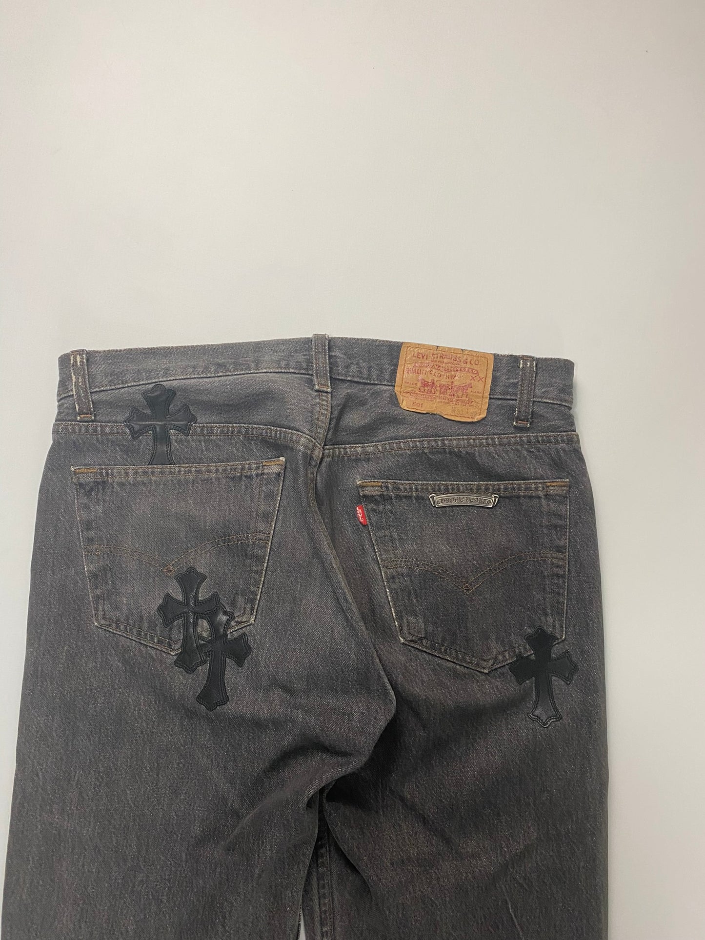 Chrome Hearts Levi’s 501 cross patched jeans in washed out black / grey SZ:W32