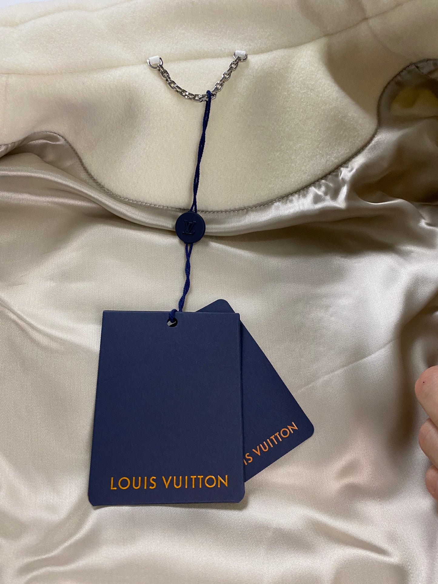 X \ Fashion Drops على X: Louis Vuitton Fall/Winter 2022 Creme Bunny Varsity  Jacket by Virgil Abloh
