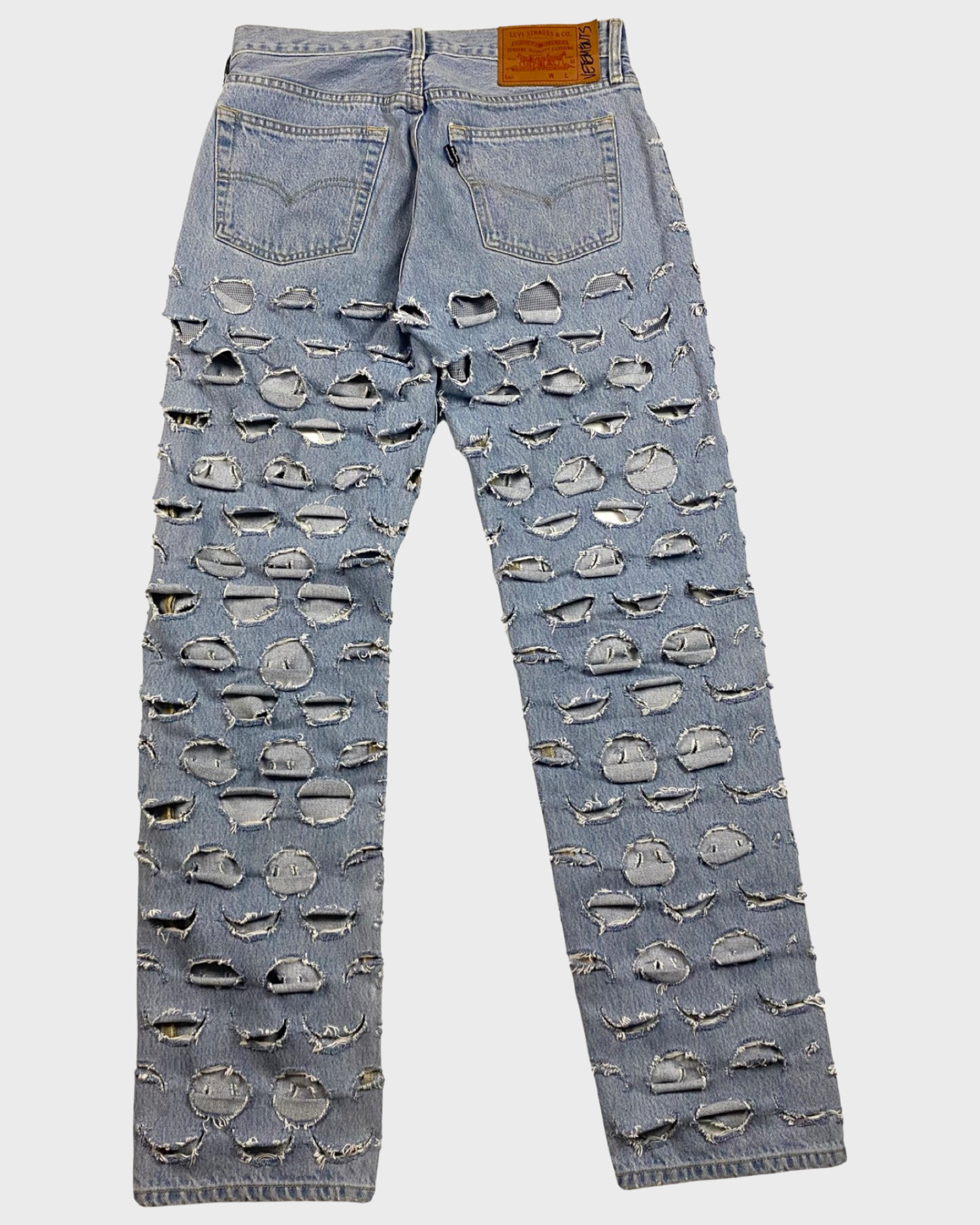Vetements AW18 lasercut distressed Levi s denim jeans SZ W31
